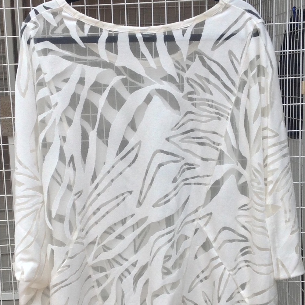 Lane Bryant burnout top in cream color.